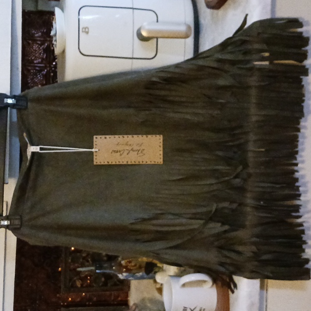 Green Sheryl Crow fringe skirt